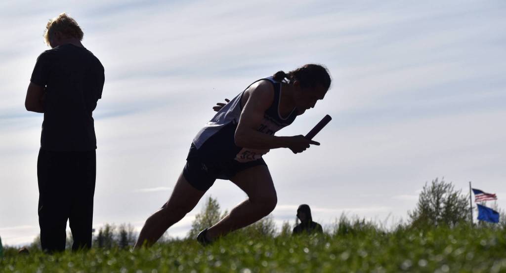 Soldotnas Gabriel Almeida starts the 1,600-meter relay at the Division I state track and field meet Saturday, May 25, 2024, at Dimond High School in Anchorage, Alaska. The Stars finished third. (Photo by Jeff Helminiak/Peninsula Clarion)