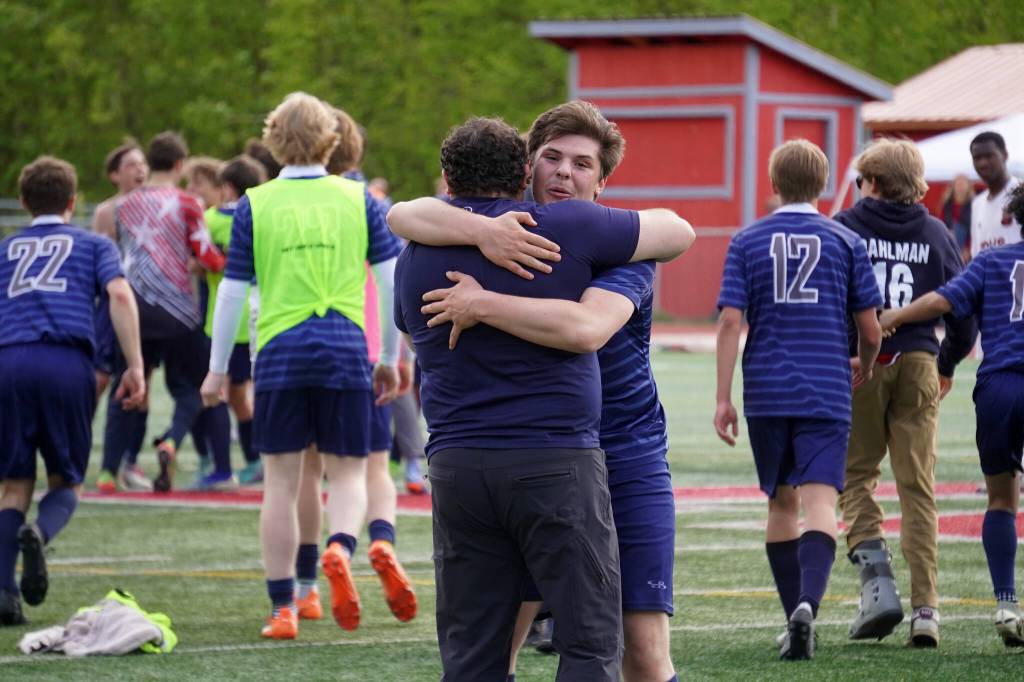 Soldotnas Gehret Medcoff celebrates winning the state title with his team during the ASAA Division II Soccer State Championships at Veterans Memorial Field in Wasilla, Alaska, on Saturday, May 25, 2024. (Jake Dye/Peninsula Clarion)