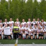 The Kenai Central High School girls are awarded the state title after winning the ASAA Soccer Division II State Championships at Veterans Memorial Field in Wasilla, Alaska, on Saturday, May 25, 2024. (Jake Dye/Peninsula Clarion)