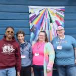 (from left to right) Ted Carter, Josephine Ryan, Jerrina Reed and Lindsey Wood with Homer Pride pose outside the Fireweed Mountain ZenDen Cafe during the Liberation Kickoff on Saturday, June 1, 2024 in Homer, Alaska. (Delcenia Cosman/Homer News)
