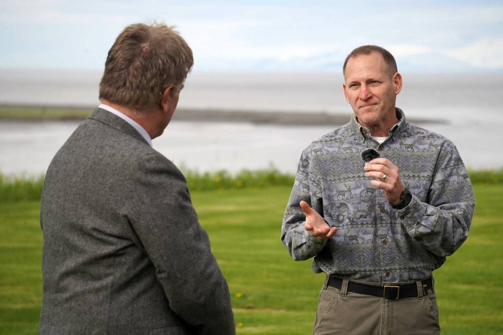 City of Kenai Mayor Brian Gabriel and Acting Program Manager Randy Bowker from the U.S. Army Corps of Engineers speak at the ribbon cutting for the Kenai River Bluff Stabilization Project on the bluff above the Kenai River in Kenai, Alaska, on Monday, June 10, 2024. (Jake Dye/Peninsula Clarion)