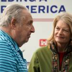 Former Mayor of Kenai John Williams and Sen. Lisa Murkowski chat with one another at the ribbon cutting for the Kenai River Bluff Stabilization Project on the bluff above the Kenai River in Kenai, Alaska, on Monday, June 10, 2024. (Jake Dye/Peninsula Clarion)