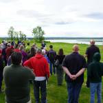 Attendees gather for the ribbon cutting for the Kenai River Bluff Stabilization Project on the bluff above the Kenai River in Kenai, Alaska, on Monday, June 10, 2024. (Jake Dye/Peninsula Clarion)
