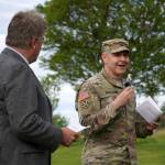 City of Kenai Mayor Brian Gabriel and Col. Jeffrey Palazzini, Alaska district commander for the U.S. Army Corps of Engineers, speak at the ribbon cutting for the Kenai River Bluff Stabilization Project on the bluff above the Kenai River in Kenai, Alaska, on Monday, June 10, 2024. (Jake Dye/Peninsula Clarion)