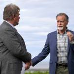 City of Kenai Mayor Brian Gabriel and Kenai Peninsula Borough Mayor Peter Micciche speak at the ribbon cutting for the Kenai River Bluff Stabilization Project on the bluff above the Kenai River in Kenai, Alaska, on Monday, June 10, 2024. (Jake Dye/Peninsula Clarion)