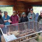 Jake Dye/Peninsula Clarion
Jonathan Wilson leads a tour at the Kbeq Cultural Heritage Interpretive Site near Cooper Landing on Friday.