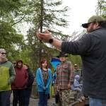 Jonathan Wilson leads a tour at the Kbeq Cultural Heritage Interpretive Site near Cooper Landing, Alaska, on Friday, June 7, 2024. (Jake Dye/Peninsula Clarion)