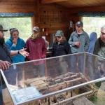 Jonathan Wilson leads a tour at the Kbeq Cultural Heritage Interpretive Site near Cooper Landing, Alaska, on Friday, June 7, 2024. (Jake Dye/Peninsula Clarion)