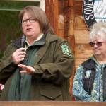 Ruth DAmico from the Seward District of the U.S. Forest Service speaks during a reopening celebration for the Kbeq Cultural Heritage Interpretive Site near Cooper Landing, Alaska, on Friday, June 7, 2024. (Jake Dye/Peninsula Clarion)