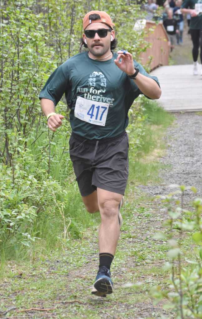 Mikey Stone runs to victory in the 5-kilometer mens race at the Run for the River on Saturday, June 8, 2024, in Soldotna, Alaska. (Photo by Jeff Helminiak/Peninsula Clarion)