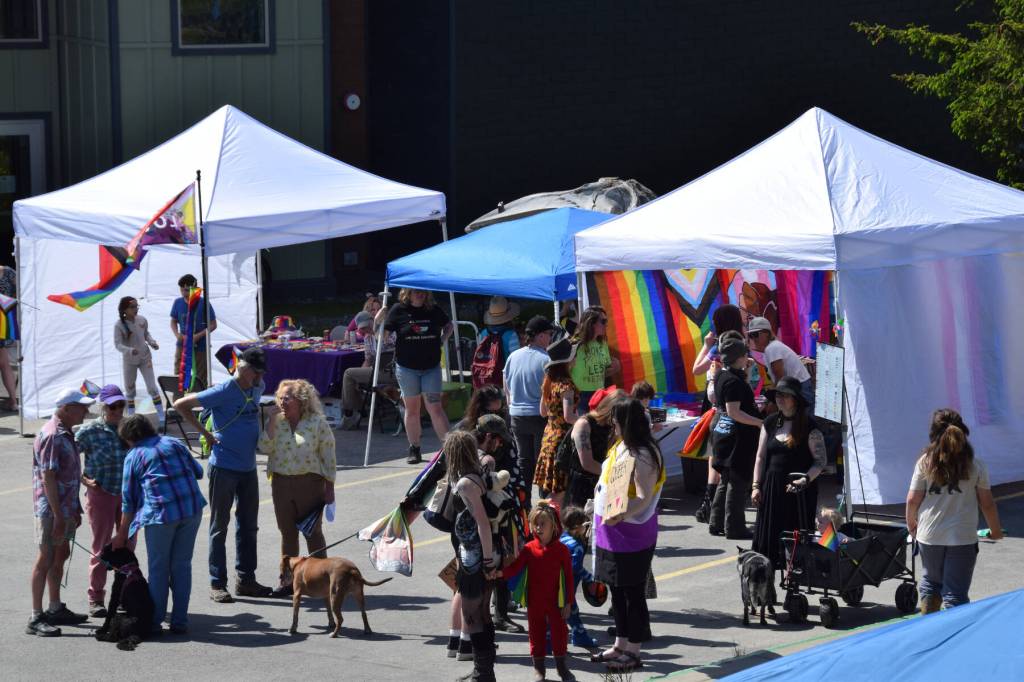 Community members attend the Homer Pride Liberation Celebration in the Kachemak Bay Campus parking lot on Saturday, June 15, 2024, in Homer, Alaska. (Delcenia Cosman/Homer News)