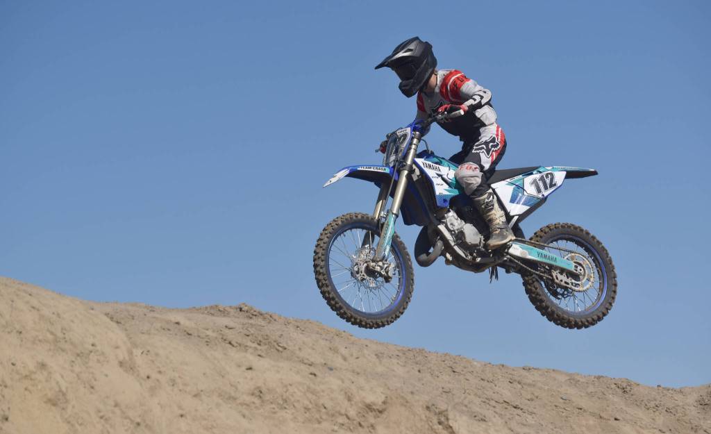 Soldotnas Draiden Mullican competes at 250 Intermediate at Alaska State Motocross Race #4 at Twin City Raceway in Kenai, Alaska, on Sunday, June 16, 2024. (Photo by Jeff Helminiak/Peninsula Clarion)