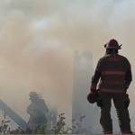 Homer Volunteer Fire Department works to extinguish an abandoned building on Lake Street on Friday, June 21, in Homer, Alaska. (Photo by Christina Whiting/courtesy)