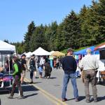 Community members browse vendors wares at the 2nd annual Summer Solstice Fair on Saturday, June 22, 2024, in Homer, Alaska. (Delcenia Cosman/Homer News)