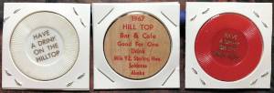 These three drink tokens, probably all from the 1960s, came from Hilltop Bar and Café, in Soldotna, and were contributed by Jim Taylor.