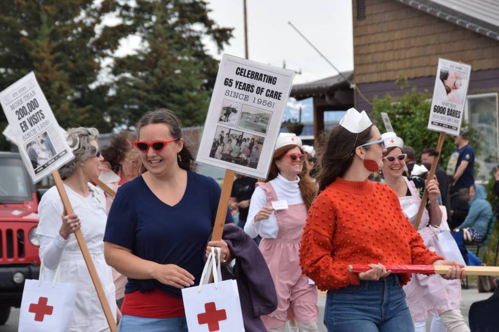 South Peninsula Hospital employees march in the Fourth of July parade, celebrating 65 years of care on Thursday, July 4, 2024, in Homer, Alaska. (Delcenia Cosman/Homer News)