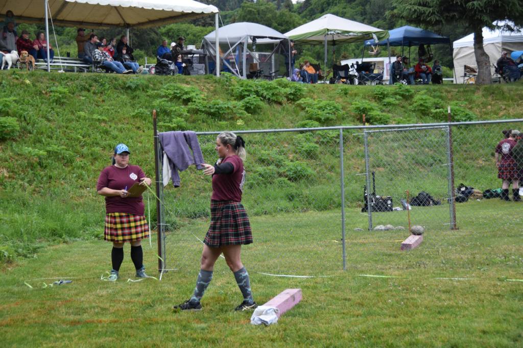 Sian Cooper, the reigning Australian champion with multiple national records, prepares to throw the braemar stone during the 12th annual Kachemak Bay Scottish Highland Games on Saturday, July 6, 2024, at Karen Hornaday Park in Homer, Alaska. (Delcenia Cosman/Homer News)