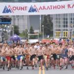 The junior race starts Thursday, July 4, 2024, at the Mount Marathon Race in Seward, Alaska. (Photo by Jeff Helminiak/Peninsula Clarion)