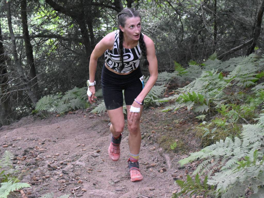 Palmers Denali Strabel, a 2008 graduate of Seward High School, takes on the base of the mountain in the womens race at the Mount Marathon Race on Thursday, July 4, 2024, in Seward, Alaska. (Photo by Jeff Helminiak/Peninsula Clarion)