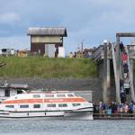 Passengers on the MS Westerdam descend Ramp 8 to board the lifeboat that will take them back to the cruise ship on Friday, June 28, 2024, in Homer, Alaska. (Delcenia Cosman/Homer News)