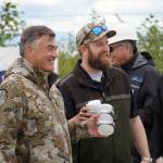 HEX President and CEO John Hendrix and Furie Operations Engineer Hunter Van Wyhe celebrate a successful test of a drone that flies beyond visual line of sight with its returned cargo, a pair of sample water bottles, at Furies central processing facility in Nikiski, Alaska, on Wednesday, July 10, 2024. (Jake Dye/Peninsula Clarion)