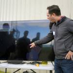 Mike Dubois, of Raytheon, gives a tour of a radar display that shows the location of a drone flying beyond visual line of sight while also searching for other aircraft or boats during a test of the drone at Furie Operating Alaskas central processing facility in Nikiski, Alaska, on Wednesday, July 10, 2024. (Jake Dye/Peninsula Clarion)