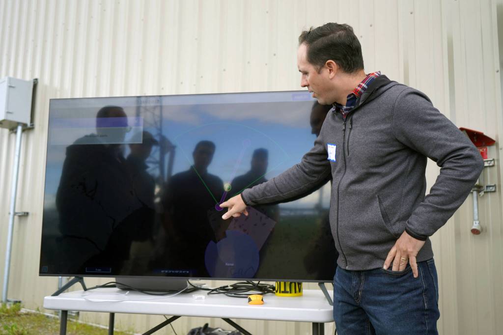 Mike Dubois, of Raytheon, gives a tour of a radar display that shows the location of a drone flying beyond visual line of sight while also searching for other aircraft or boats during a test of the drone at Furie Operating Alaskas central processing facility in Nikiski, Alaska, on Wednesday, July 10, 2024. (Jake Dye/Peninsula Clarion)