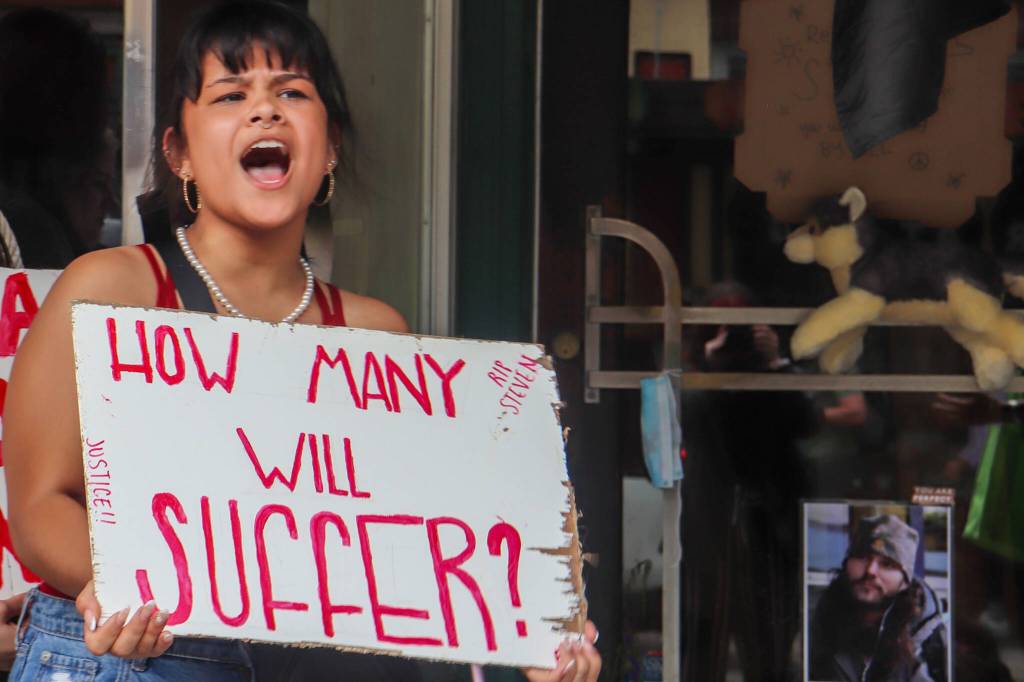 Jasz Garrett / Juneau Empire
Ariilana Shodda-Lee chants in a protest held for Juneau resident Steven Kissack on Sunday. A memorial for him can be partially seen behind her on Front Street.