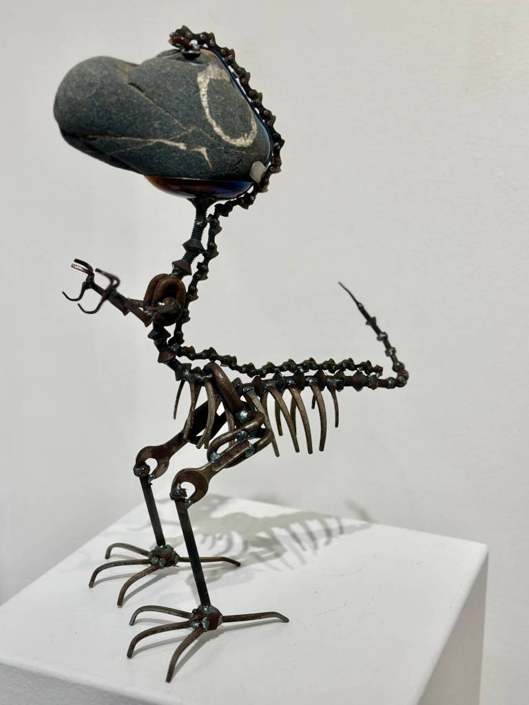 Rockasaurus, photographed on Friday, July 26, 2024, is a metal and rock sculpture by Don Henry on display through August in his mixed-media exhibit at Fireweed Gallery in Homer, Alaska. Photo by Christina Whiting
