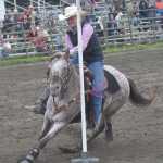Hally Hanson competes in Pole Bending at the third Soldotna Equestrian Association rodeo of the season Sunday, July 28, 2024, at the Soldotna Rodeo Grounds in Soldotna, Alaska. (Photo by Jeff Helminiak/Peninsula Clarion)