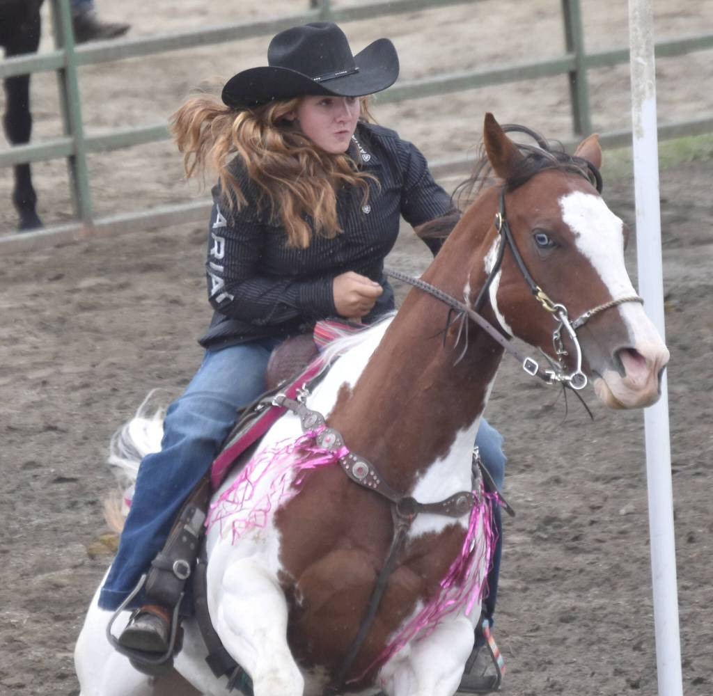 Jade Campbell competes in Pole Bending at the third Soldotna Equestrian Association rodeo of the season Sunday, July 28, 2024, at the Soldotna Rodeo Grounds in Soldotna, Alaska. (Photo by Jeff Helminiak/Peninsula Clarion)