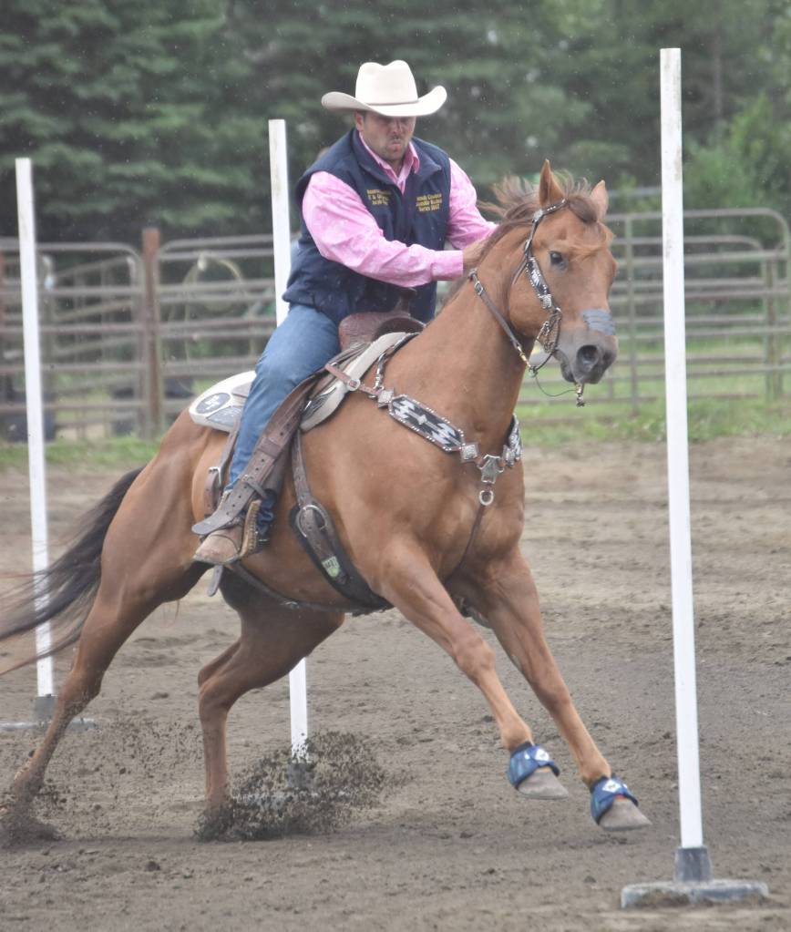 Jacob Fowler competes in Pole Bending at the third Soldotna Equestrian Association rodeo of the season Sunday, July 28, 2024, at the Soldotna Rodeo Grounds in Soldotna, Alaska. (Photo by Jeff Helminiak/Peninsula Clarion)