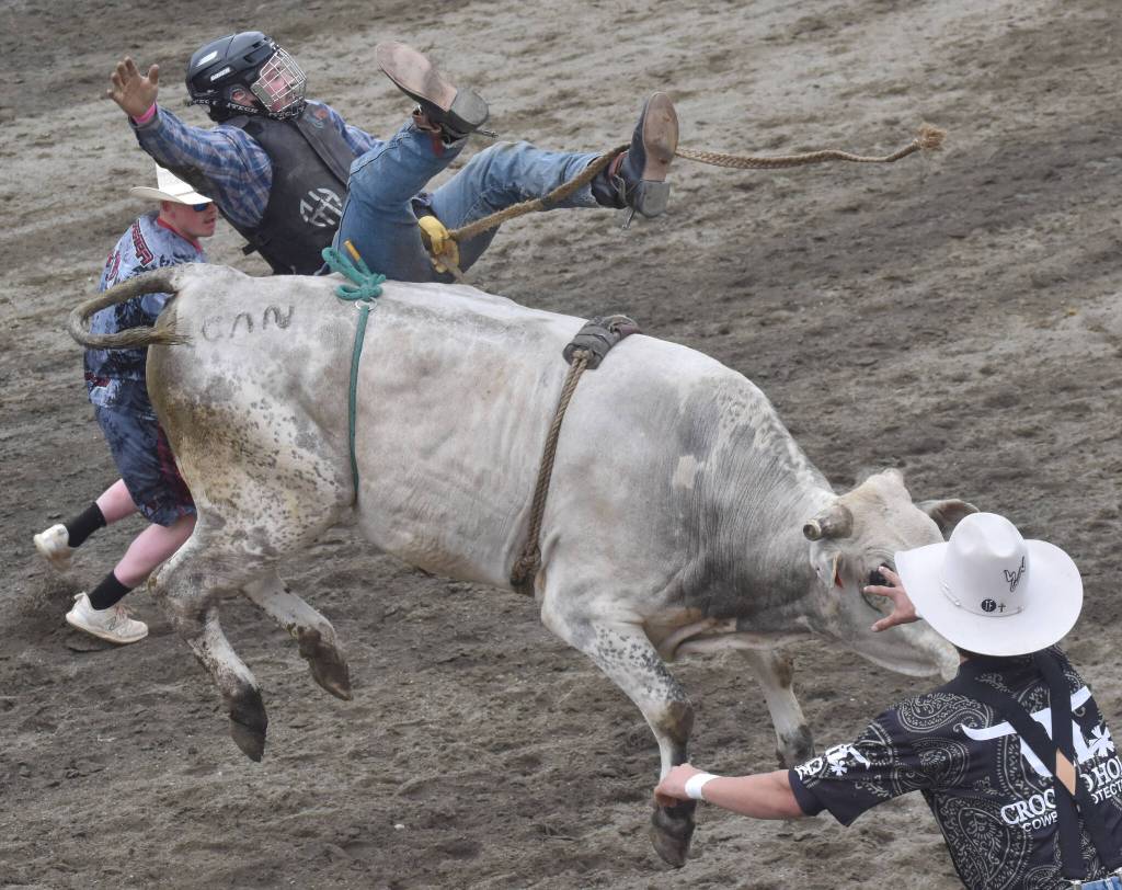 Jesse Kitson competes in Bull Riding at the third Soldotna Equestrian Association rodeo of the season Sunday, July 28, 2024, at the Soldotna Rodeo Grounds in Soldotna, Alaska. (Photo by Jeff Helminiak/Peninsula Clarion)