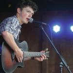 Silas Luke Jones performs on the Ocean Stage at the Kenai Peninsula Fair in Ninilchik, Alaska, on Friday, Aug. 11, 2023. (Jake Dye/Peninsula Clarion)