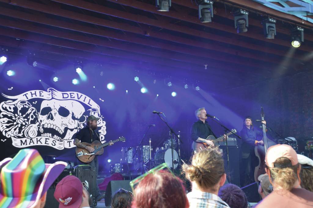 Headlining band, The Devil Makes Three, performs at the River Stage Amphitheater during Salmonfest on Sunday, Aug. 4<ins>,</ins><ins> 2024,</ins> in Ninilchik<ins>,</ins> <ins>Alaska</ins>. (Delcenia Cosman/Homer News)