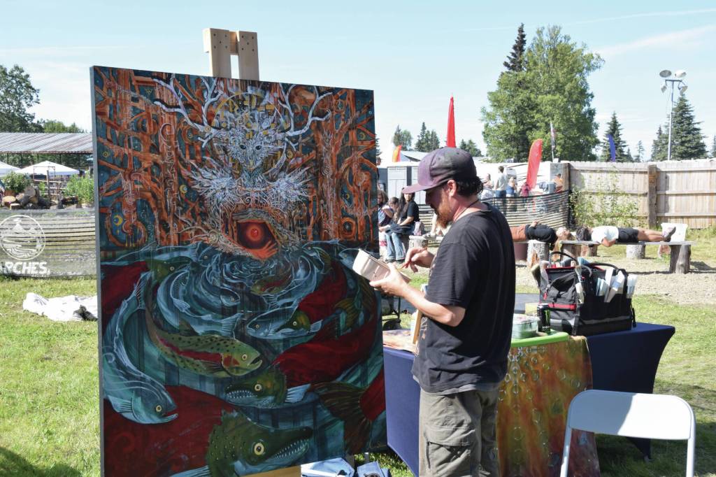 Delcenia Cosman/Homer News
Anchorage-based artist Adam Shea paints live at Salmonfest next to the River Stage Amphitheater on Sunday, Aug. 4<ins>,</ins><ins> 2024,</ins> in Ninilchik<ins>,</ins> <ins>Alaska</ins>.
