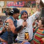 Michael Franti & Spearhead perform with members of the crowd at Salmonfest in Ninilchik, Alaska, on Saturday, Aug. 3, 2024. (Jake Dye/Peninsula Clarion)