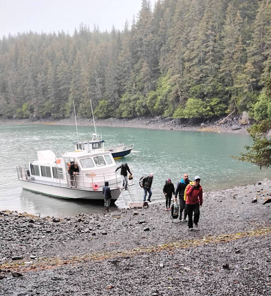 Participants in the Grace Ridge Run/Hike Kachemak Bay Mountain Classic disembark Makos Water Taxi at the race starting area on Saturday, Aug. 10, 2024, at the South Grace Trail head in Kachemak Bay State Park, Alaska. Photo courtesy of Kathy Sarns