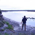 A lone hooligan fisherman heads upstream on the lower Kenai River to try his luck from Cunningham Memorial Park. (Clark Fair photo)