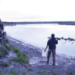 A lone hooligan fisherman heads upstream on the lower Kenai River to try his luck from Cunningham Memorial Park. (Clark Fair photo)