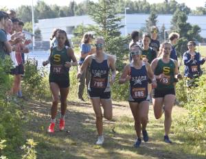 Sewards Olive Jordan, Soldotnas Kathryn DeBardelaben, Soldotnas Kathryn Cox and Sewards Selah Brueckner compete in the freshmen-sophomore girls race Monday, Aug. 19, 2024, at Nikiski Middle-High School at the Peninsula Class Races in Nikiski, Alaska. (Photo by Jeff Helminiak/Peninsula Clarion)