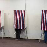 Voters fill out their ballots at the Soldotna Regional Sports Complex in Soldotna, Alaska, during the Alaska Primary Election Day on Tuesday, Aug. 20, 2024. (Jake Dye/Peninsula Clarion)