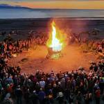 Community members gather around the ignited 2023 Burning Basket, titled Create, on Sept 10, 2023 at Mariner Park in Homer, Alaska. Photo provided by Mavis Muller