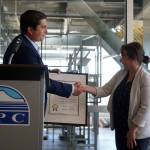 Kenai Peninsula College Director Cheryl Siemers receives a legislative citation on behalf of KPC in recognition of the colleges 60th anniversary presented by Rep. Justin Ruffridge during a celebration of that anniversary at Kenai Peninsula College in Soldotna, Alaska, on Tuesday, Aug. 20, 2024. (Jake Dye/Peninsula Clarion)