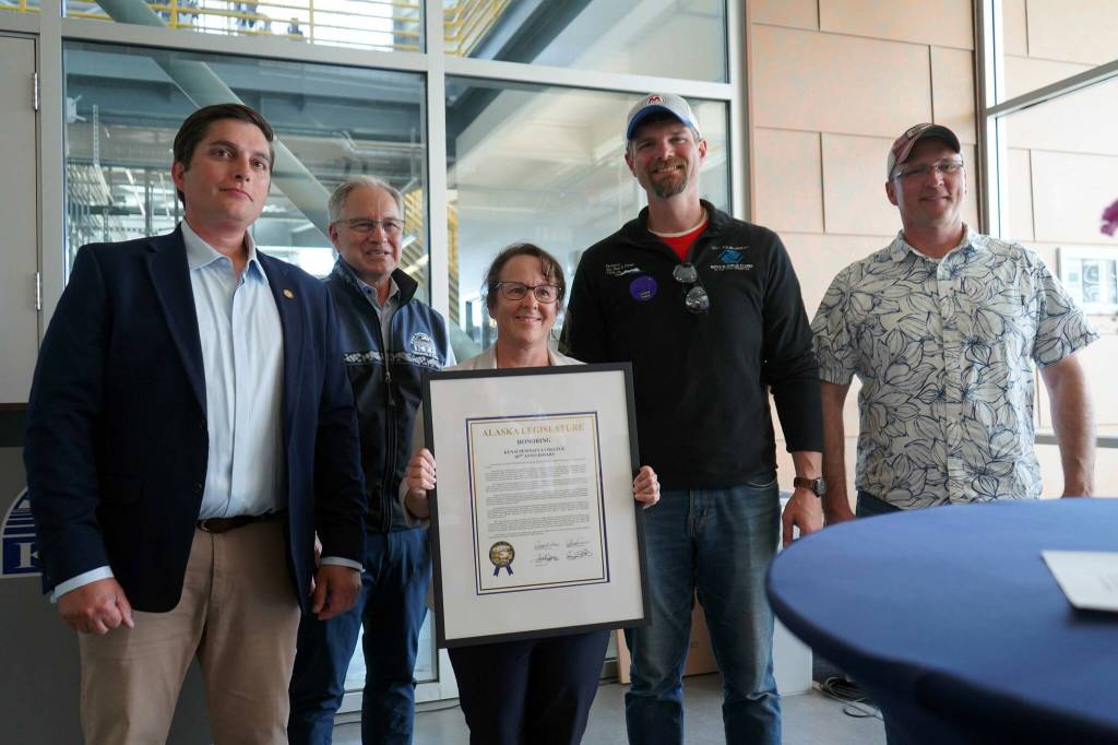 Jake Dye/Peninsula Clarion
Kenai Peninsula College Director Cheryl Siemers, center, and University of Alaska Anchorage Chancellor Sean Parnell, center left, receive a legislative citation on behalf of KPC in recognition of the colleges 60th anniversary presented by Rep. Justin Ruffridge, Sen. Jesse Bjorkman and Rep. Ben Carpenter during a celebration of that anniversary at Kenai Peninsula College in Soldotna, Alaska, on Tuesday, Aug. 20, 2024.