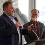 Kenai Peninsula Borough School District Superintendent Clayton Holland and Kenai Peninsula Borough Mayor Peter Micciche speak at a celebration of the 60th anniversary of Kenai Peninsula College in Soldotna, Alaska, on Tuesday, Aug. 20, 2024. (Jake Dye/Peninsula Clarion)