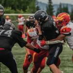 Homer High School mariner varsity football player Jackson Snaric, #32, junior returning a kickoff during the August 30, 3034 night bout against the visiting Fairbanks West Valley Wolfpack on the mariner field. He is assisted by Ellington Dudley, #74, junior. (Photo provided by Wilhelm Hakala, Homer High School yearbook staff)