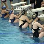 Photo by Emilie Springer/Homer News
Mariner swim team members Cassidy Carroll and Avery Briscoe prepare for the 100-yard backstroke at the Mariner pool on Sept. 7, 2024, in Homer, Alaska.