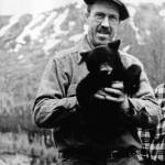 Warren Melville Nutter, seen here holding a black bear cub in an undated photo likely taken in Hope, lived nearly half of his life on the Kenai Peninsula. (Photo courtesy of the Nutter Family Collection)