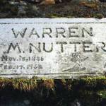 In the Hope Cemetery, the grave marker for Warren Melville Nutter contains errors in his birth year and his age. The illustration, however, captures his adventurous spirit. (Photo courtesy of findagrave.com)